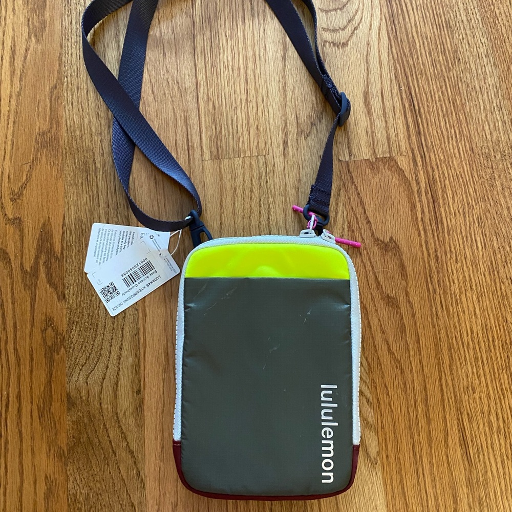 Lululemon easy access crossbody in neon yellow, dark pink, and grey!